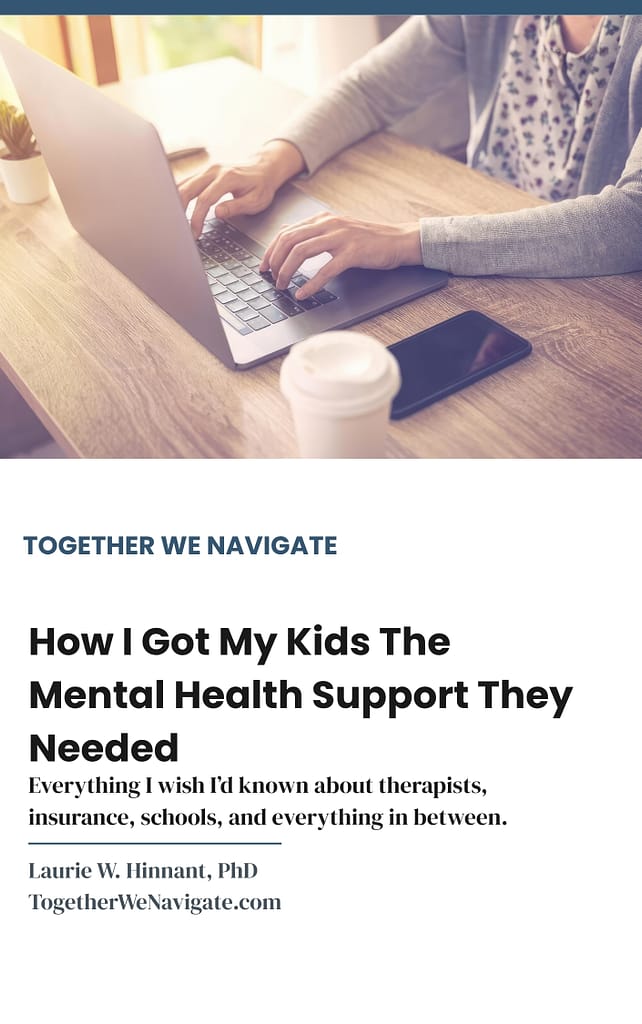 Woman sits at table with an open laptop, cell phone and a cup of coffee, searching for mental health resources for her kids.